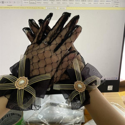 Găng tay nữ lưới đen đính nơ lưới sang trọng mẫu mới t12/2022