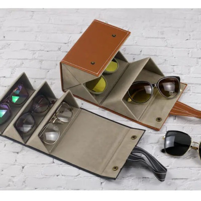 Hộp da PU đựng mắt kính 3 ngăn cuộn tròn , có nút bấm tiện lợi ,có thể treo hoặc xách , mang đi mọi nơi , bảo vệ mắt kính khỏi bụi và hư hỏng 