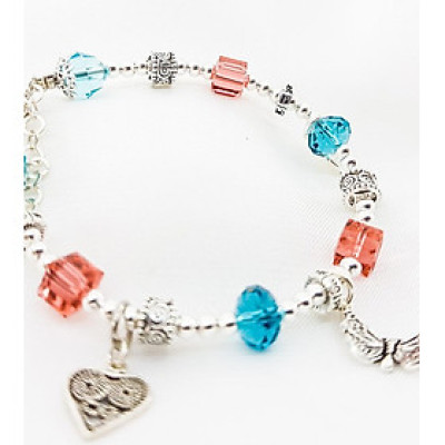 Vòng tay mệnh đá pha lê mix charm hoa+ tim