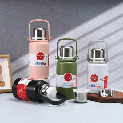 Bình Giữ Nhiệt Cup Inox 316 Nắp Kèm Cốc Có Tấm Lọc Trà, Tay Cầm Tiện Lợi - giao mầu ngẫu nhiên