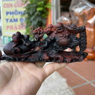 Tượng phật di lặc kéo bao tiền bằng gỗ trắc đỏ đen kt 15×4×7cm 