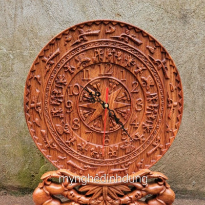 Tranh đồng hồ khắc trống đồng đông sơn trang trí phòng khách bằng gỗ hương đá kt mặt tròn 27×3×37cm  