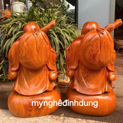 Tượng phật di lặc đắt cò bằng gỗ hương đá cao 50cm