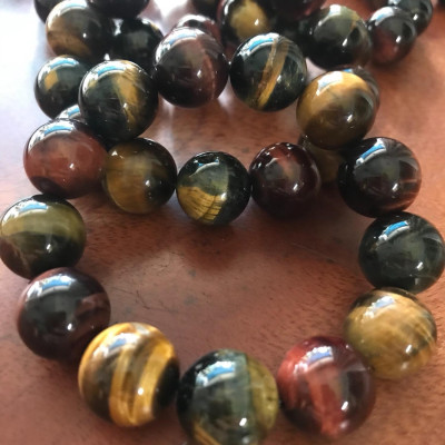 VÒNG ĐẸP ĐÁ MẮT HỔ TỰ NHIÊN 16MM NAM ĐEO A1