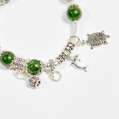 Vòng tay phong thủy nữ đá diopside charm kim quy 8mm mệnh hỏa , mộc - Ngọc Quý Gemstones