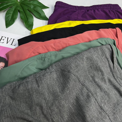 Quần Jogger Nữ Chất Vải Gió Dù Phong Cách Thể Thao